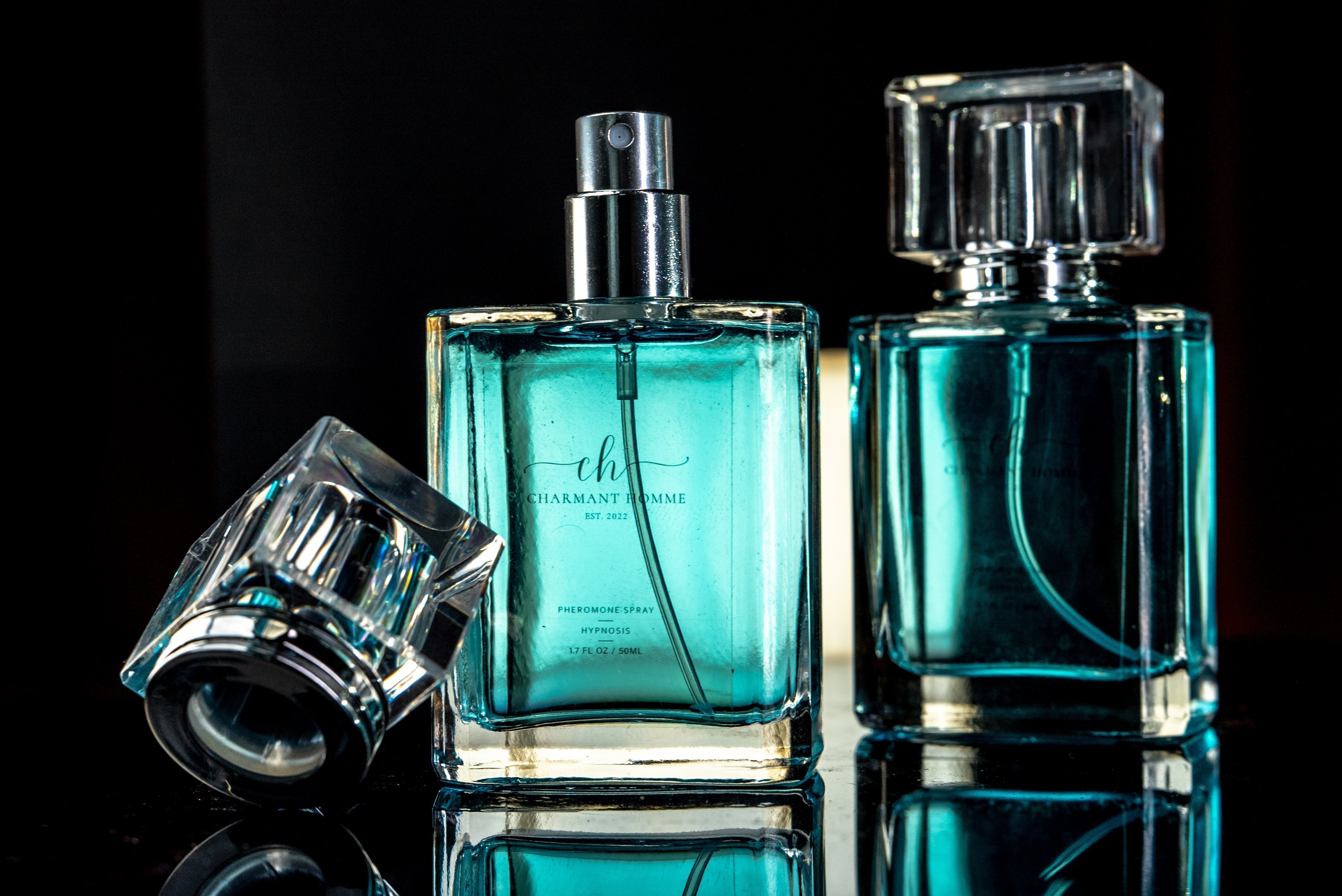 Two Bottles of Charmant Homme Pheromone Cologne